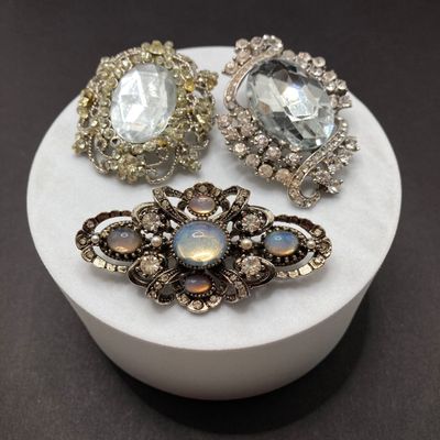 LOT 243: Three Rhinestone / Stone Brooch / Pin Collection - Art and More