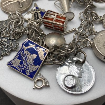 LOT 235: Vintage Elco Sterling Silver Charm Bracelet with Safety Chain and Charms - 54.3gtw