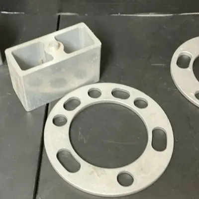 BODY LIFT BLOCKS/ ALUMINUM WHEEL SPACERS 