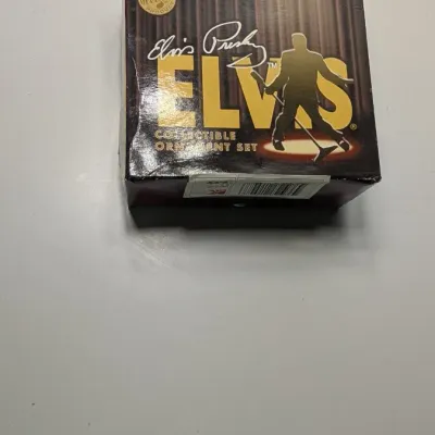 Sale Photo Thumbnail #220: Boxes have damage 

Nostalgic 4-inch pieces frequently feature Elvis in his iconic Aloha shirt strumming a ukulele,


4-inch figure produced by Trevco in 2002. It features Elvis in his iconic black leather outfit from the famous '68 Comeback SpecialThe El