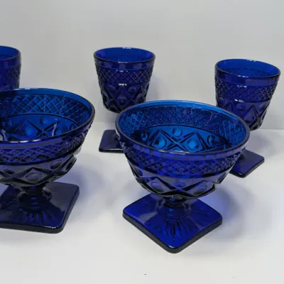 Sale Photo Thumbnail #182: The Pair of Vintage Cape Cod Cobalt Blue Glass Low Sherbet Cups by Imperial Glass (Pattern 160) measure approximately 3.25" tall and 3.5" to 3.625" in diameter

Cobalt stemware and blue glassware add a striking jewel-toned elegance to any table
5 cobalt s