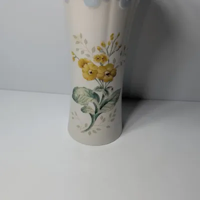Sale Photo Thumbnail #58: The Lenox Butterfly Meadow vase, designed by artist Louise Le Luyer, is crafted from durable white porcelain and features iconic transferware of vibrant flowers, butterflies, and insects.