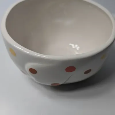 Sale Photo Thumbnail #143: The TAG (often sold as Tag Kitchen) Polka Dot Chicken Covered Nesting Candy Dishes feature a whimsical, dual-compartment design. Made of ceramic, these brightly colored lidded bowls measure roughly 5 inches long and 6.5 inches tall, making them ideal coun