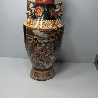 Sale Photo Thumbnail #35: Approx 15 1/2" tall - Vintage hand-painted Oriental vases with gold handles typically feature Japanese Satsuma-style, intricate Chinoiserie floral motifs, or traditional Chinese court scenes