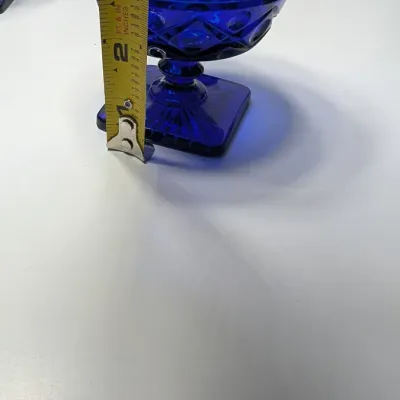 Sale Photo Thumbnail #190: The Pair of Vintage Cape Cod Cobalt Blue Glass Low Sherbet Cups by Imperial Glass (Pattern 160) measure approximately 3.25" tall and 3.5" to 3.625" in diameter

Cobalt stemware and blue glassware add a striking jewel-toned elegance to any table
5 cobalt s