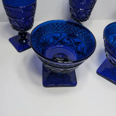Sale Photo Thumbnail #183: The Pair of Vintage Cape Cod Cobalt Blue Glass Low Sherbet Cups by Imperial Glass (Pattern 160) measure approximately 3.25" tall and 3.5" to 3.625" in diameter

Cobalt stemware and blue glassware add a striking jewel-toned elegance to any table
5 cobalt s
