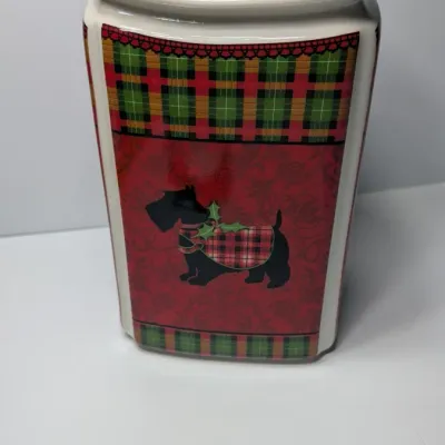 Sale Photo Thumbnail #155: The Christmas Scotty collection by 222 Fifth (PTS) is a highly sought-after holiday dinnerware line featuring a classic Scottish Terrier wearing an argyle sweater, set against a vibrant green, red, and yellow plaid backdrop. Because this specific holiday 