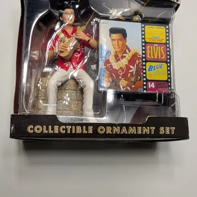 Sale Photo Thumbnail #218: Boxes have damage 

Nostalgic 4-inch pieces frequently feature Elvis in his iconic Aloha shirt strumming a ukulele,


4-inch figure produced by Trevco in 2002. It features Elvis in his iconic black leather outfit from the famous '68 Comeback SpecialThe El
