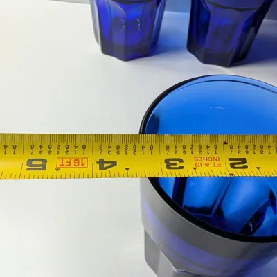 Sale Photo Thumbnail #180: The Libbey DuraTuff Gibraltar Dusky Blue 16oz Cooler Glasses are highly sought-after, discontinued pieces that bridge the gap between mid-century modern style and durable late-20th-century craftsmanship. While the classic paneled Gibraltar design dates ba