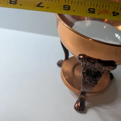 Sale Photo Thumbnail #18: The vintage Princess House copper and brass coffee carafe with stand is a popular 1960s and 1970s mid-century piece designed for elegant tabletop coffee or tea service