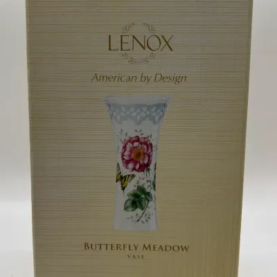 Sale Photo Thumbnail #64: The Lenox Butterfly Meadow vase, designed by artist Louise Le Luyer, is crafted from durable white porcelain and features iconic transferware of vibrant flowers, butterflies, and insects.