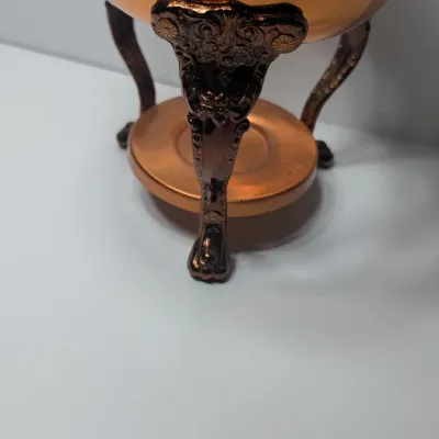 Sale Photo Thumbnail #6: The vintage Princess House copper and brass coffee carafe with stand is a popular 1960s and 1970s mid-century piece designed for elegant tabletop coffee or tea service