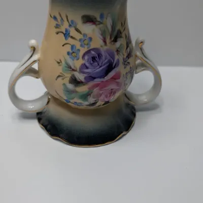 Sale Photo Thumbnail #94: Vintage 5-inch hand-painted Nippon porcelain hat pin holders, featuring classic floral motifs and gold trim, typically date between 1891 and 1921