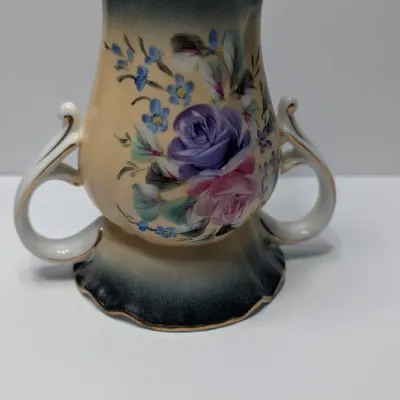 Sale Photo Thumbnail #95: Vintage 5-inch hand-painted Nippon porcelain hat pin holders, featuring classic floral motifs and gold trim, typically date between 1891 and 1921