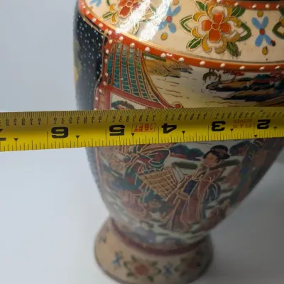 Sale Photo Thumbnail #42: Approx 15 1/2" tall - Vintage hand-painted Oriental vases with gold handles typically feature Japanese Satsuma-style, intricate Chinoiserie floral motifs, or traditional Chinese court scenes