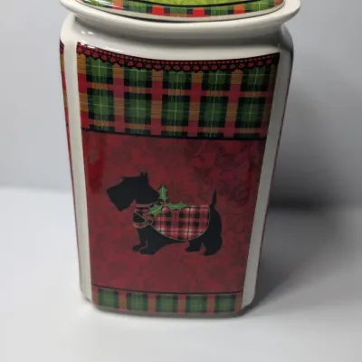 Sale Photo Thumbnail #154: The Christmas Scotty collection by 222 Fifth (PTS) is a highly sought-after holiday dinnerware line featuring a classic Scottish Terrier wearing an argyle sweater, set against a vibrant green, red, and yellow plaid backdrop. Because this specific holiday 