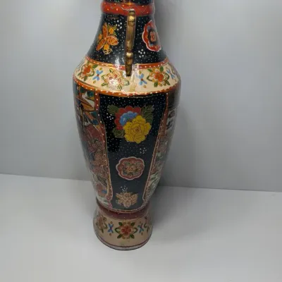 Sale Photo Thumbnail #34: Approx 15 1/2" tall - Vintage hand-painted Oriental vases with gold handles typically feature Japanese Satsuma-style, intricate Chinoiserie floral motifs, or traditional Chinese court scenes