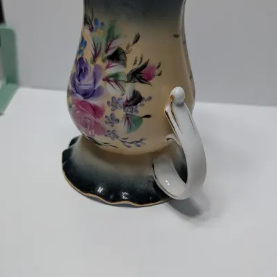 Sale Photo Thumbnail #96: Vintage 5-inch hand-painted Nippon porcelain hat pin holders, featuring classic floral motifs and gold trim, typically date between 1891 and 1921