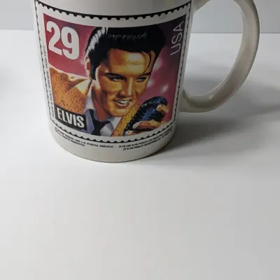 Sale Photo Thumbnail #170: Elvis Presley Stamp Mug, Silhouette Elvis Mug & one with bold letters