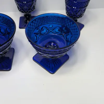 Sale Photo Thumbnail #186: The Pair of Vintage Cape Cod Cobalt Blue Glass Low Sherbet Cups by Imperial Glass (Pattern 160) measure approximately 3.25" tall and 3.5" to 3.625" in diameter

Cobalt stemware and blue glassware add a striking jewel-toned elegance to any table
5 cobalt s