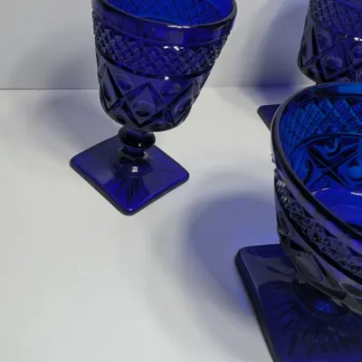 Sale Photo Thumbnail #188: The Pair of Vintage Cape Cod Cobalt Blue Glass Low Sherbet Cups by Imperial Glass (Pattern 160) measure approximately 3.25" tall and 3.5" to 3.625" in diameter

Cobalt stemware and blue glassware add a striking jewel-toned elegance to any table
5 cobalt s