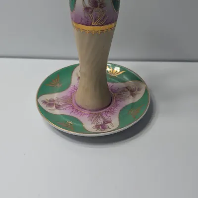 Sale Photo Thumbnail #72: The Limoges Porcelain Gold Gilded 10-Hole Hat Pin Holder is a highly collectible vintage vanity piece. Typically crafted between the late 1800s and the 1920s—the height of the Victorian and Edwardian hatpin era—these hand-painted porcelain holders fea