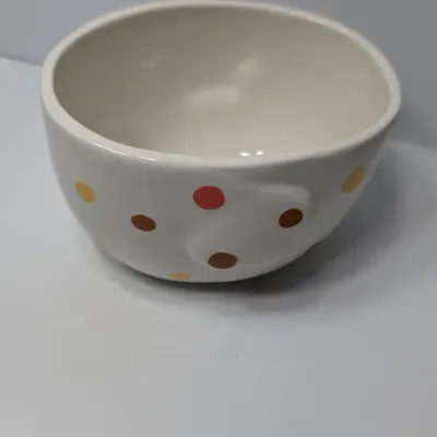 Sale Photo Thumbnail #138: The TAG (often sold as Tag Kitchen) Polka Dot Chicken Covered Nesting Candy Dishes feature a whimsical, dual-compartment design. Made of ceramic, these brightly colored lidded bowls measure roughly 5 inches long and 6.5 inches tall, making them ideal coun