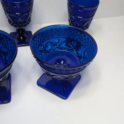 Sale Photo Thumbnail #184: The Pair of Vintage Cape Cod Cobalt Blue Glass Low Sherbet Cups by Imperial Glass (Pattern 160) measure approximately 3.25" tall and 3.5" to 3.625" in diameter

Cobalt stemware and blue glassware add a striking jewel-toned elegance to any table
5 cobalt s
