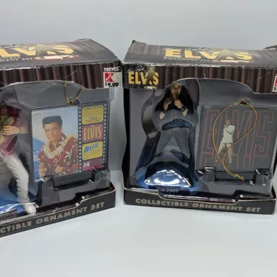 Sale Photo Thumbnail #217: Boxes have damage 

Nostalgic 4-inch pieces frequently feature Elvis in his iconic Aloha shirt strumming a ukulele,


4-inch figure produced by Trevco in 2002. It features Elvis in his iconic black leather outfit from the famous '68 Comeback SpecialThe El