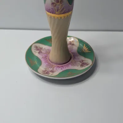 Sale Photo Thumbnail #71: The Limoges Porcelain Gold Gilded 10-Hole Hat Pin Holder is a highly collectible vintage vanity piece. Typically crafted between the late 1800s and the 1920s—the height of the Victorian and Edwardian hatpin era—these hand-painted porcelain holders fea