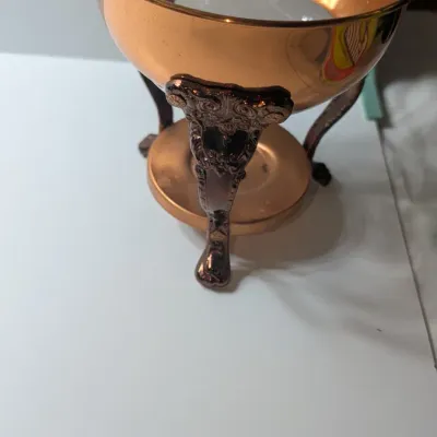 Sale Photo Thumbnail #17: The vintage Princess House copper and brass coffee carafe with stand is a popular 1960s and 1970s mid-century piece designed for elegant tabletop coffee or tea service