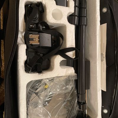 Sale Photo Thumbnail #65: Looks like it has not been used
Comes with tripod, flash, bag and camera