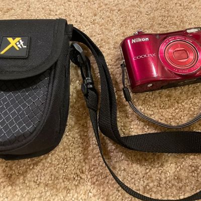 Sale Photo Thumbnail #57: Has case and turns on and takes pictures 
Has memory card