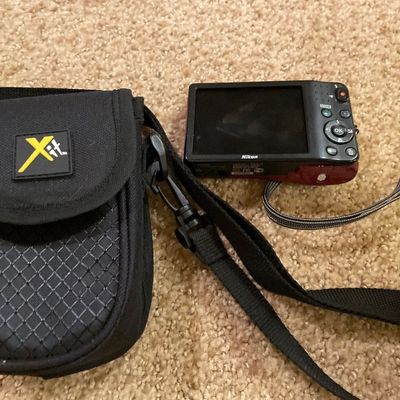Sale Photo Thumbnail #58: Has case and turns on and takes pictures 
Has memory card