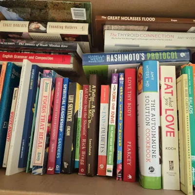 Assortment Of Books Including Cookbooks,  Self Help, Travel And More