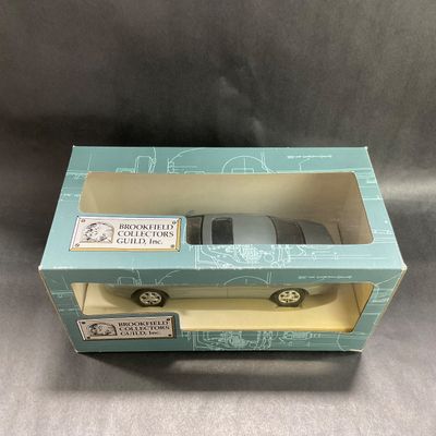 -100- 1:24 SCALE | 1996 Oldsmobile Aurora Silver Teal