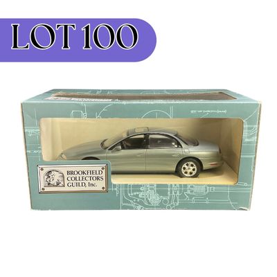 -100- 1:24 SCALE | 1996 Oldsmobile Aurora Silver Teal