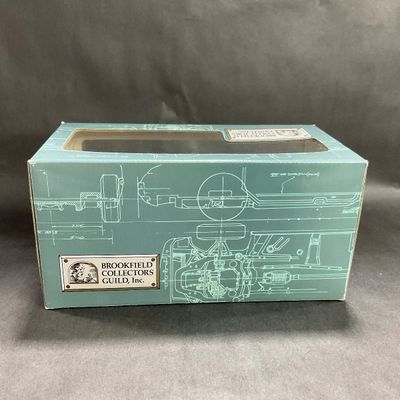 -100- 1:24 SCALE | 1996 Oldsmobile Aurora Silver Teal