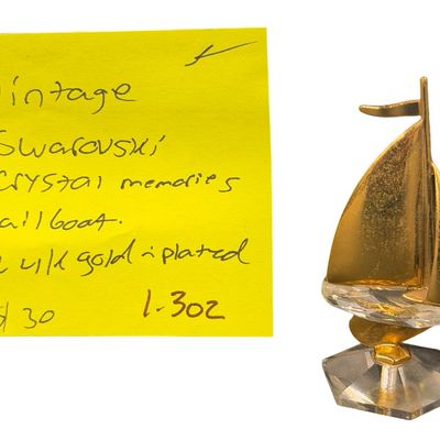 Vintage RETIRED Swarovski Crystal Memories Gold Sailboat Figurine featuring a Faceted Crystal Base and Gold-Tone Metal Accents