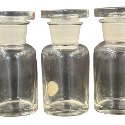 Set of Clear Glass Apothecary Jars with Matching Ground-Glass Stoppers