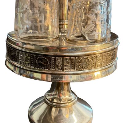 Antique Victorian Silver-Plated Condiment or Cruet Set featuring an Ornate Pedestal Stand with a Central Handle and Matching Glass Bottles