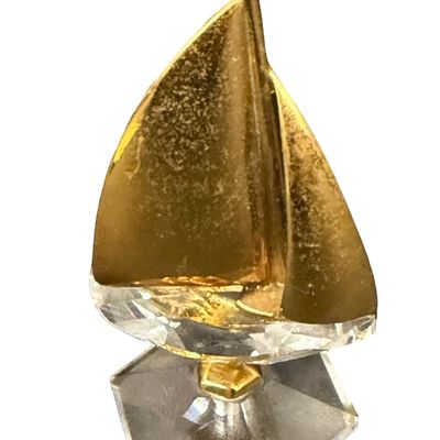 Vintage RETIRED Swarovski Crystal Memories Gold Sailboat Figurine featuring a Faceted Crystal Base and Gold-Tone Metal Accents