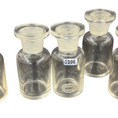 Set of Clear Glass Apothecary Jars with Matching Ground-Glass Stoppers