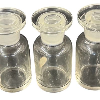 Set of Clear Glass Apothecary Jars with Matching Ground-Glass Stoppers
