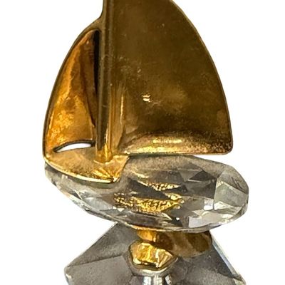 Vintage RETIRED Swarovski Crystal Memories Gold Sailboat Figurine featuring a Faceted Crystal Base and Gold-Tone Metal Accents
