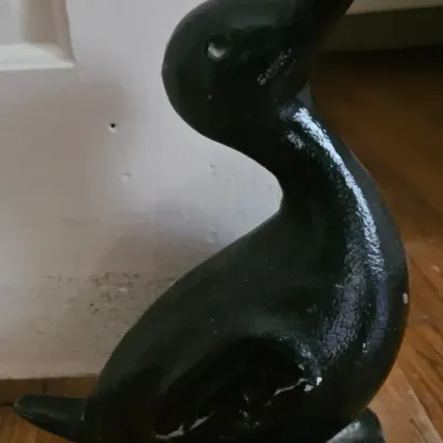 Sale Photo Thumbnail #27: Antique cast iron door stop