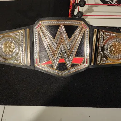 WWE Mattel Toy Lot: Championship & United States Belts with Wrestling Ring
