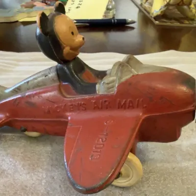 Vintage tin airplace w/ mickey mousetin car