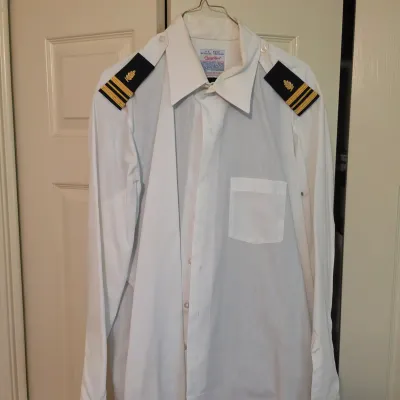 Assortment of U.S. Navy Uniforms, Caps & More (B3-JS)