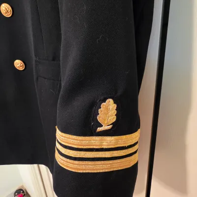 Assortment of U.S. Navy Uniforms, Caps & More (B3-JS)
